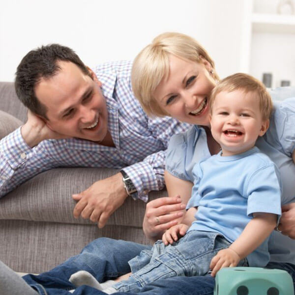 happy family with toddler