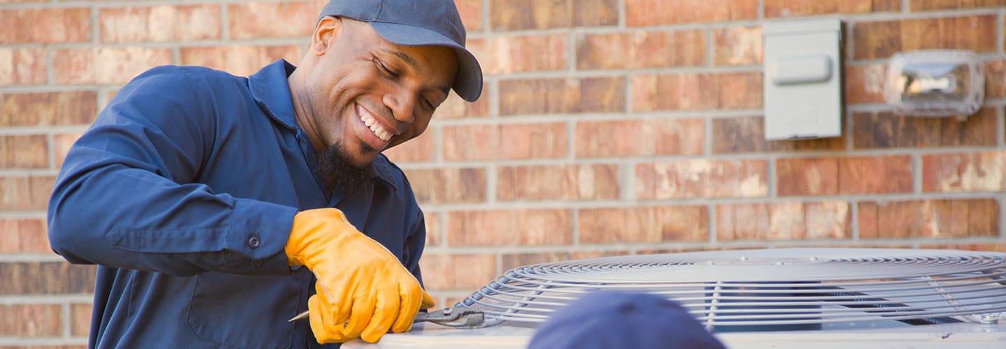 Man Repairing Ac Unit