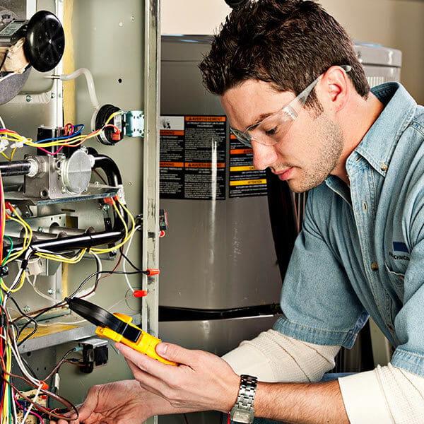 Man Repairing Furnace
